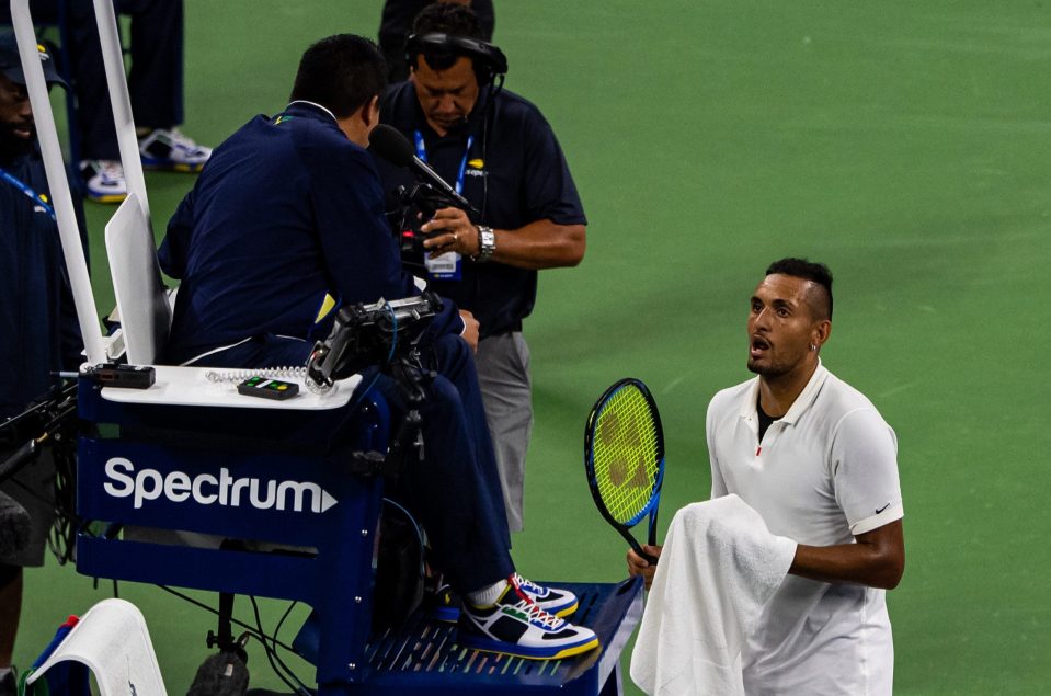  Nick Kyrgios talks to the umpire during the match against Steve Johnson