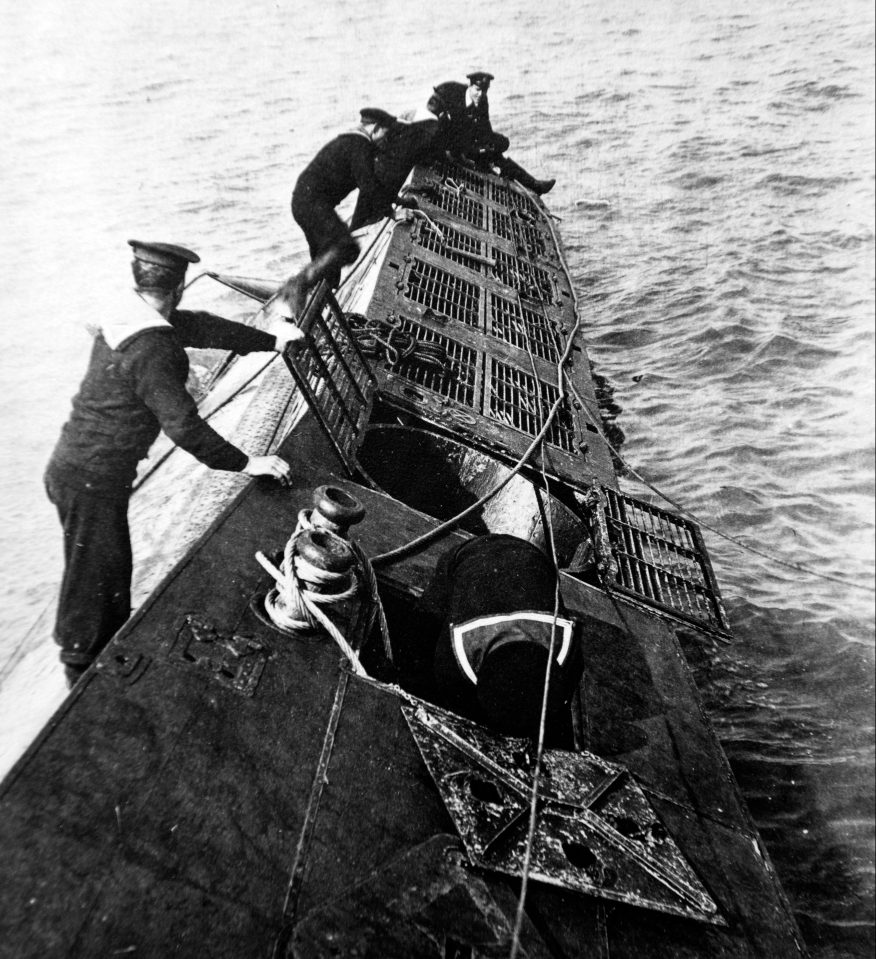  In this image, a captured German U-Boat was salvaged off the coast of Suffolk in 1916 after she ran aground