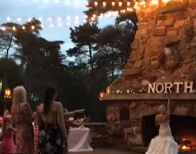 A viral video shows a woman catching a bride’s bouquet during the traditional toss