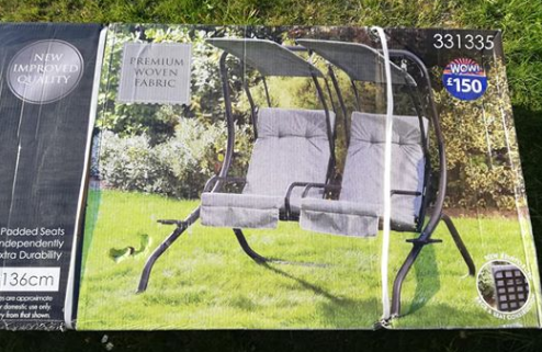  This two-seater swinging garden chair set has been reduced from £150 down to £40