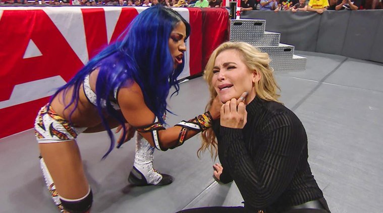  Sasha Banks sucker-punched Natalya on her shock comeback until Becky Lynch tried to make the save