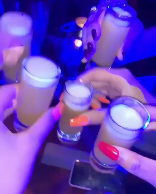  The group toasted a pal's birthday with frothy shots