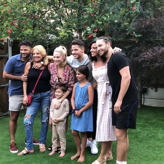  The family posed for a photo before secretly filming Scarlett's reaction