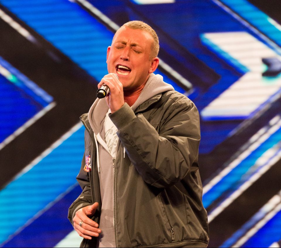  Chris performing at the singing contest's Liverpool auditions in 2012