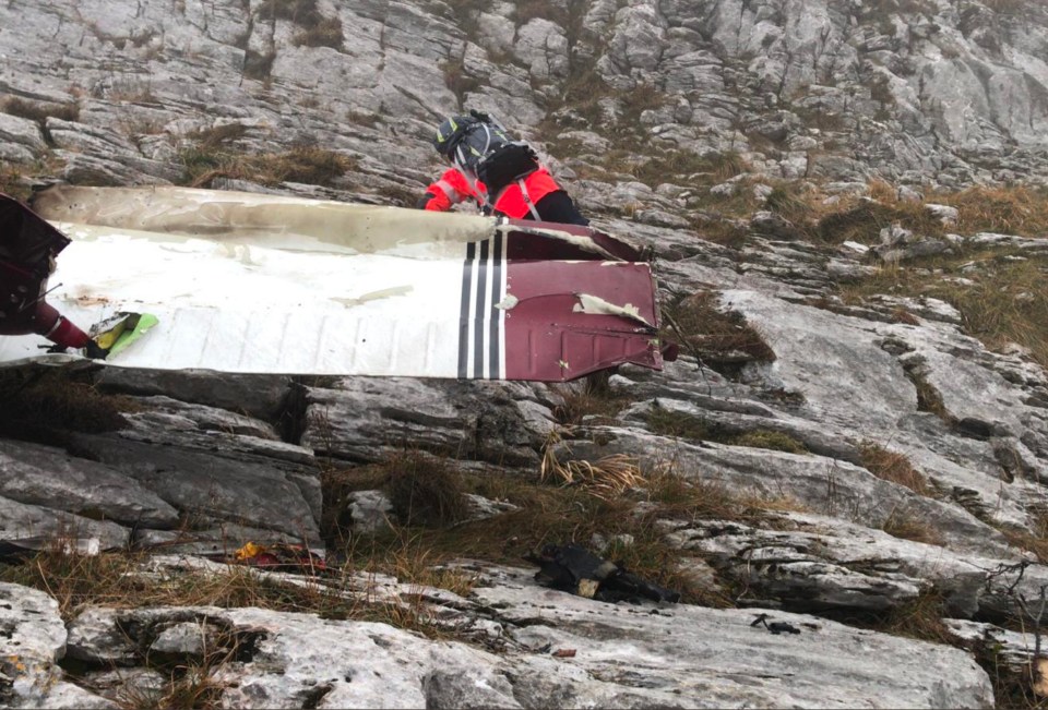  Part of the wing is recovered by rescue workers in Spain