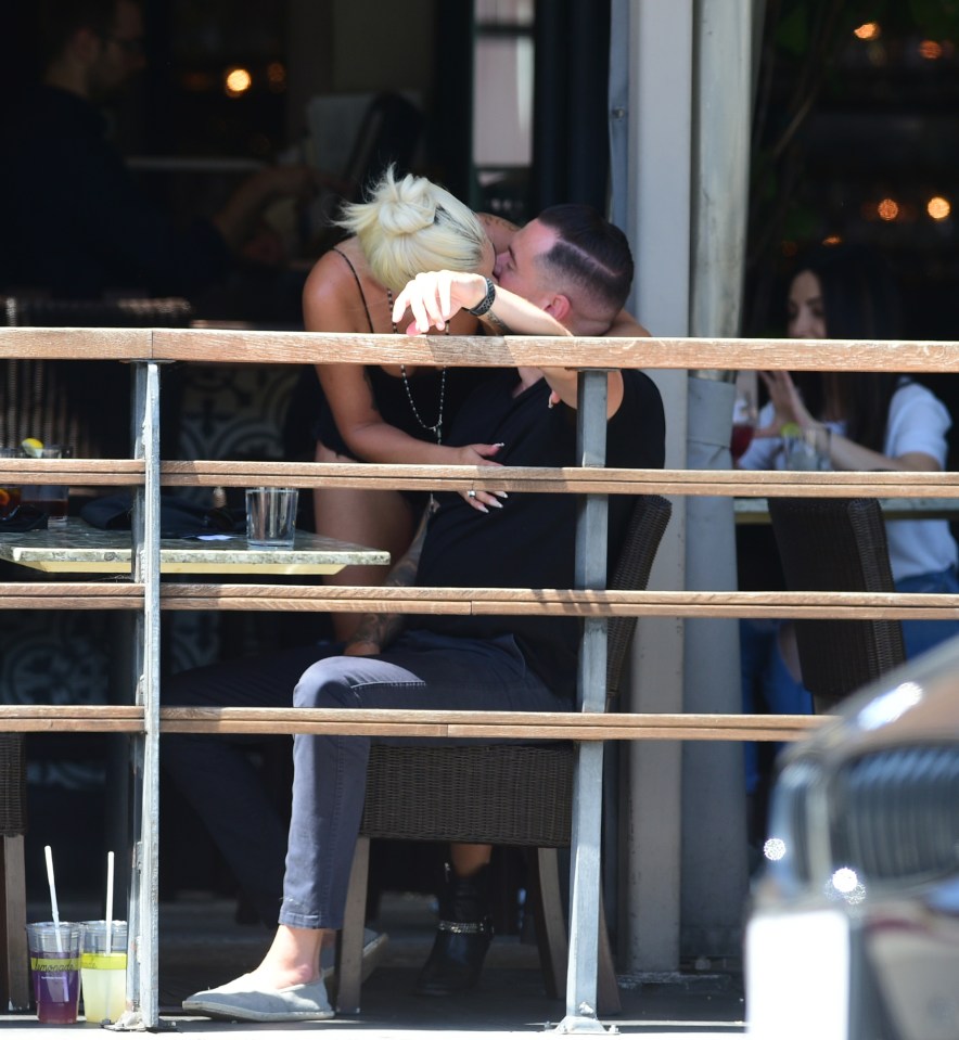  Lady Gaga didn't hold back during this lunchtime snog