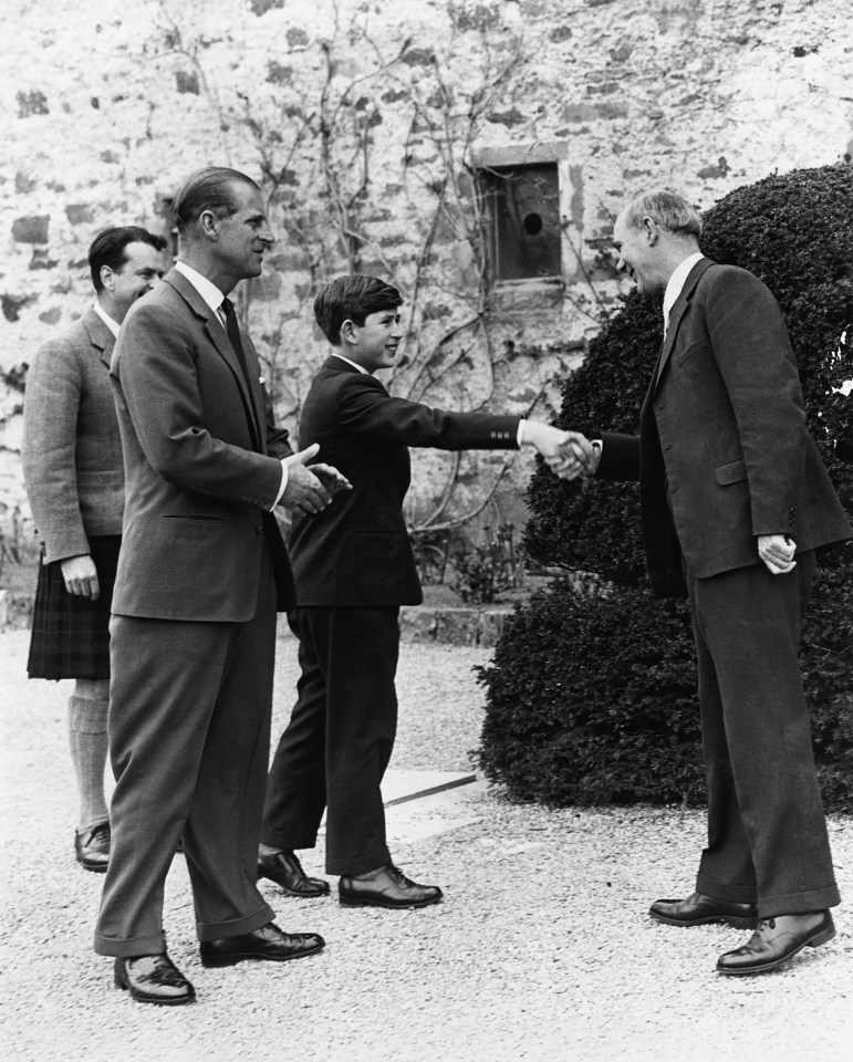  Prince Charles as a whipper snapper shaking hands with the headmaster at Gordonstoun School on his first day age 14