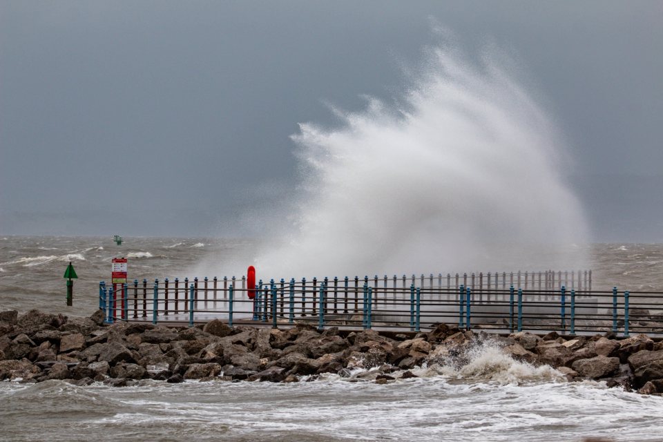  Waves whipped up by high winds break over the Grosvenor Breakwater at Morecambe, Lancs, last weekend