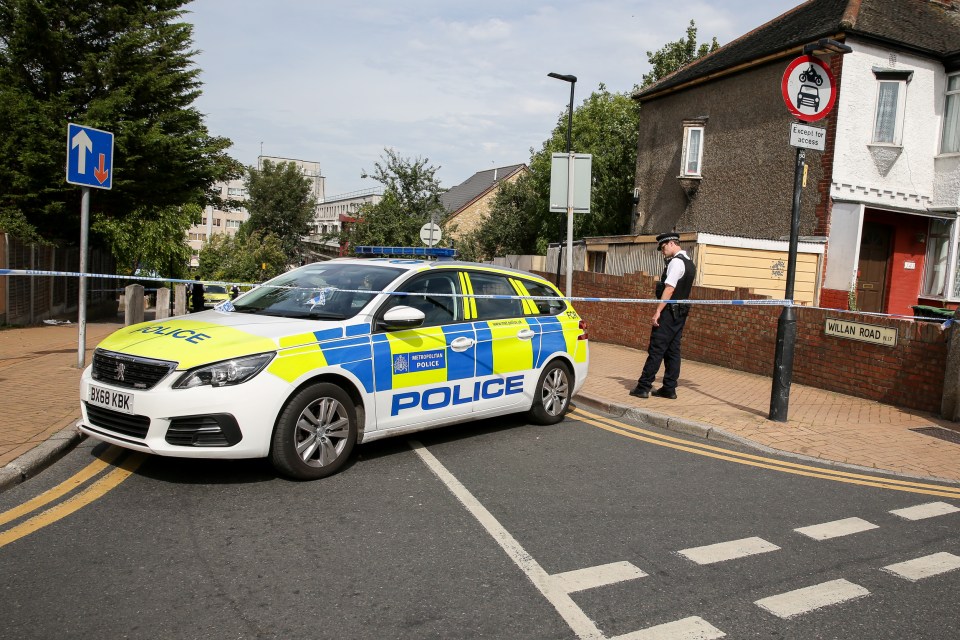  Cops at the scene in north London on Friday morning after the boy was found with stab wounds