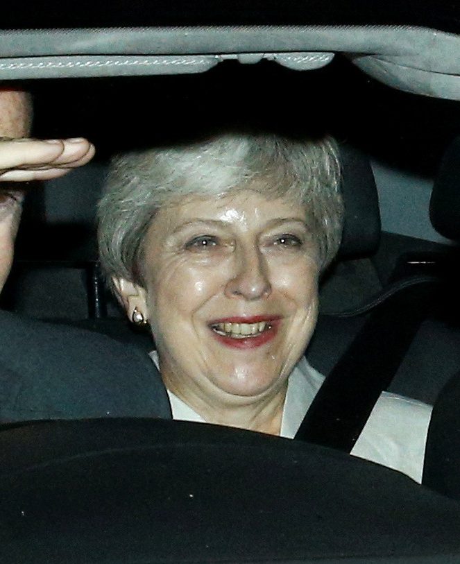  Former PM Theresa May smiles as shes driven from Parliament last night following the historic Brexit vote