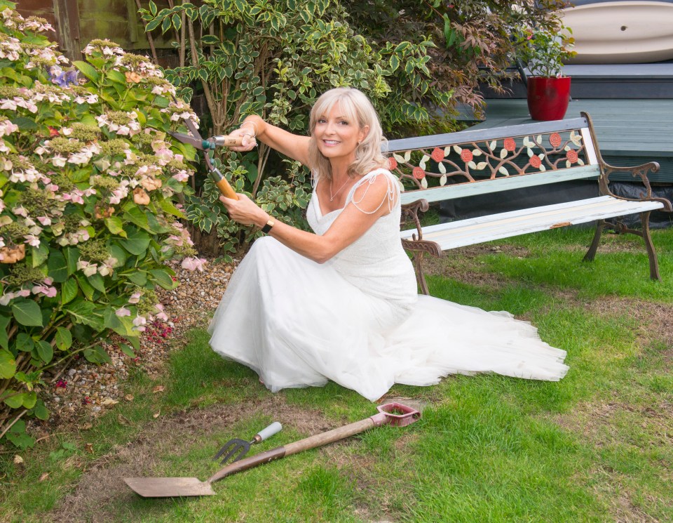  Dawn says she felt sad about boxing her dress up so decided to put it on for a BBQ - and then again to do some household chores