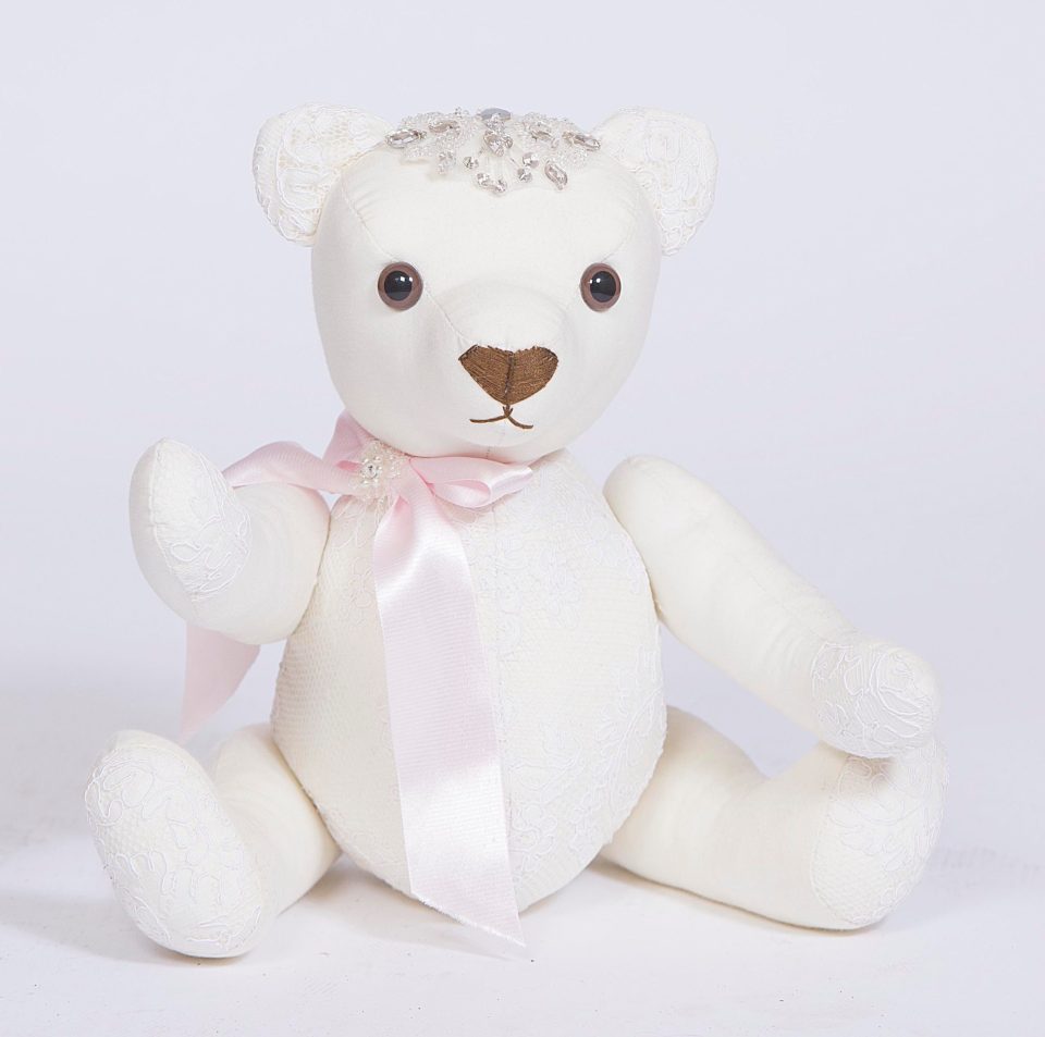  As most of the dress was ruined, she used the salvageable material to make a teddy bear for her daughter Phoebe