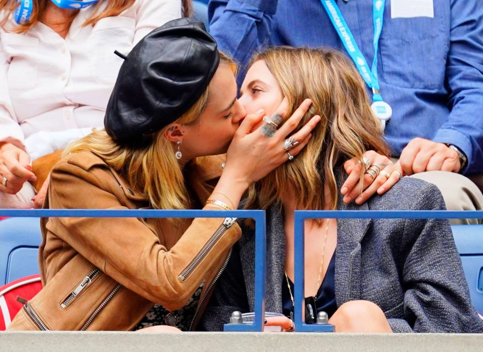  Cara Delevingne snogged girlfriend Ashley Benson as the loved-up couple watched the US Open women's final yesterday