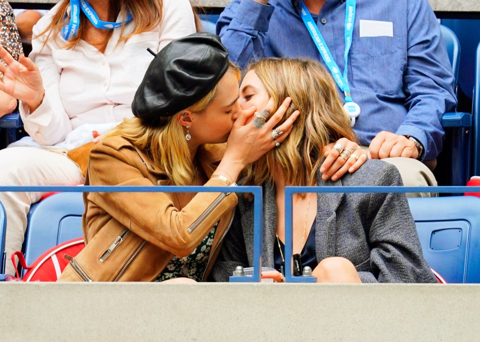  Cara Delevingne's hand placement identifies her as the dominant one in this kiss