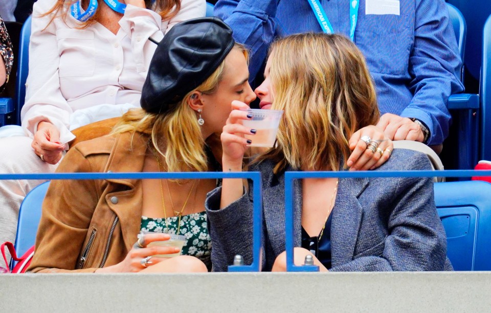  The smitten pair shared the passionate kiss inside the Arthur Ashe stadium