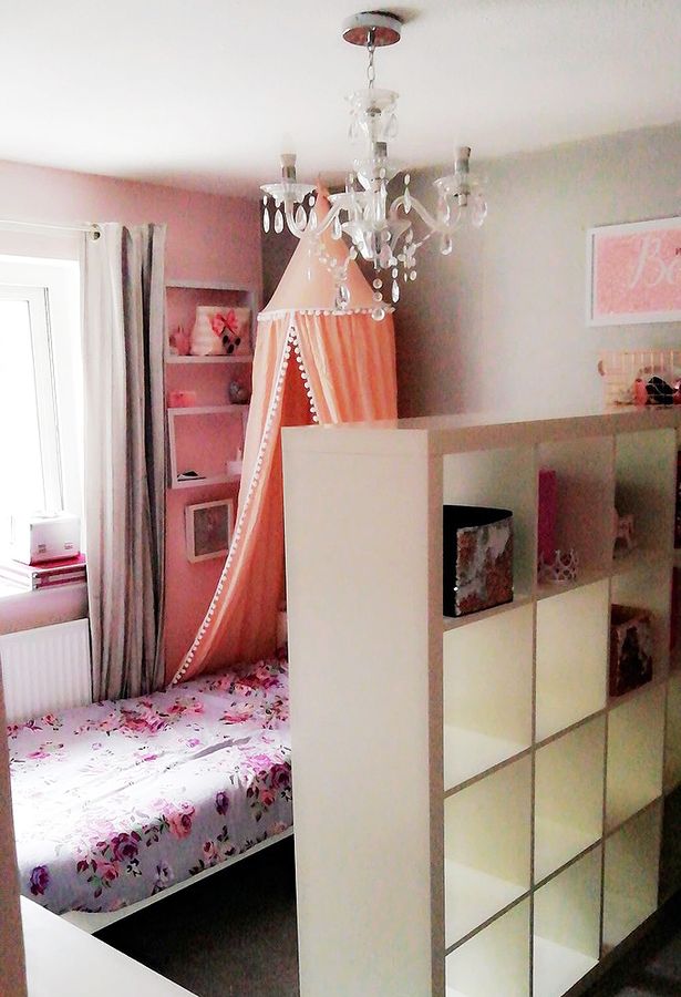 One mum used a storage unit to split her girls' room in half