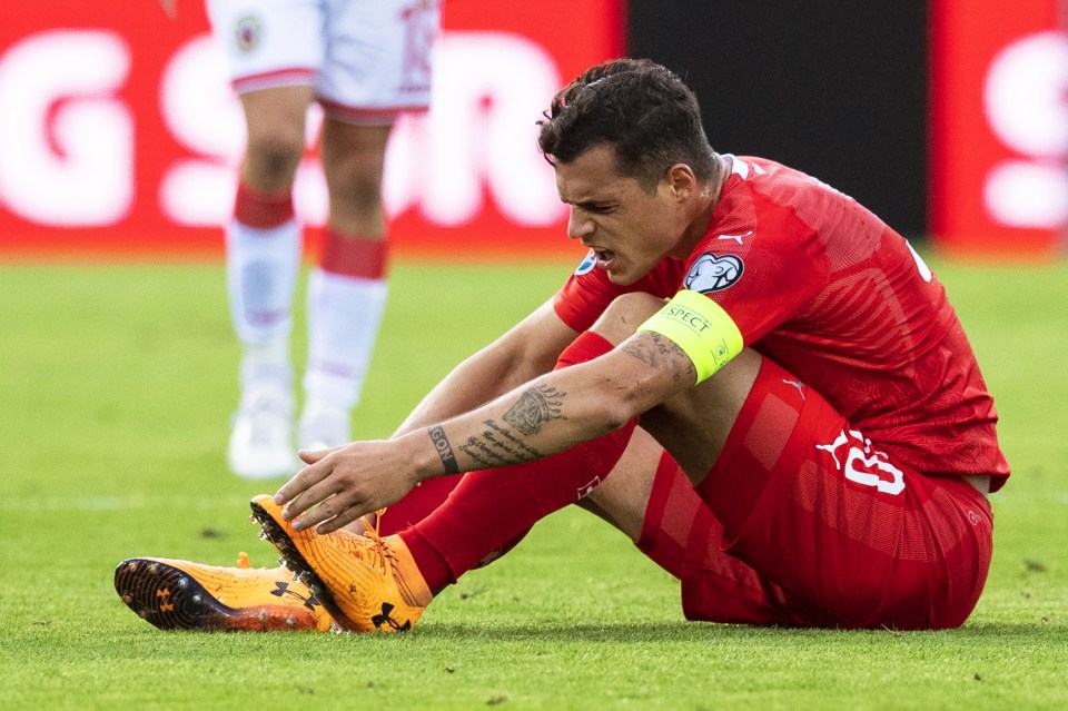  Granit Xhaka could be out for the trip to Vicarage Road after hurting himself playing for Switzerland