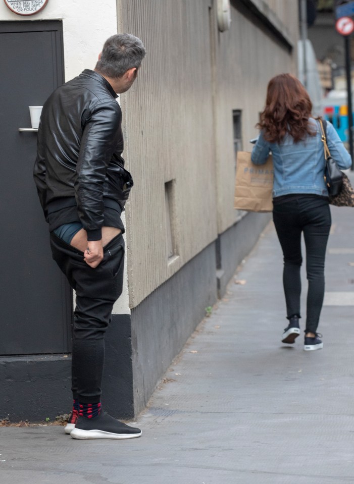  He started to pull his trousers down in the street