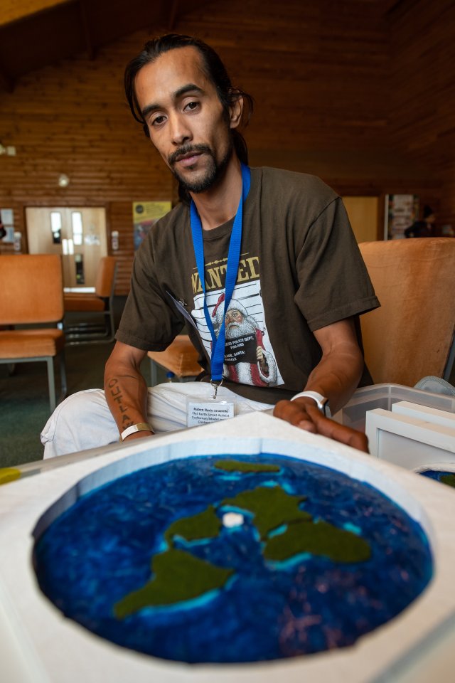  Believer and craftsman Ruben Dario Jaramillo was selling £15 models of a flat Earth at the conference