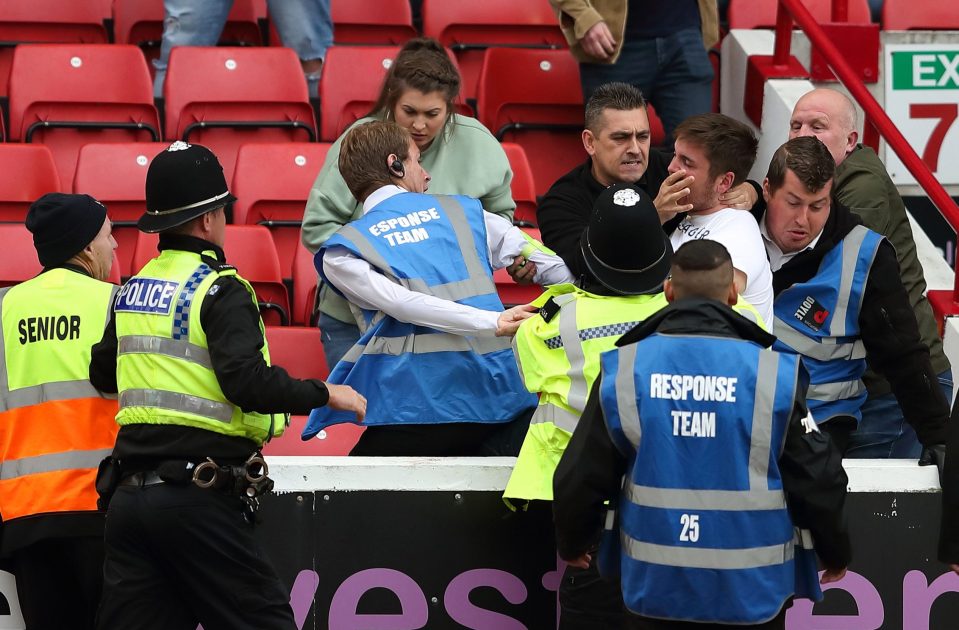  Police were forced to intervene as fans from both sides exchanged blows