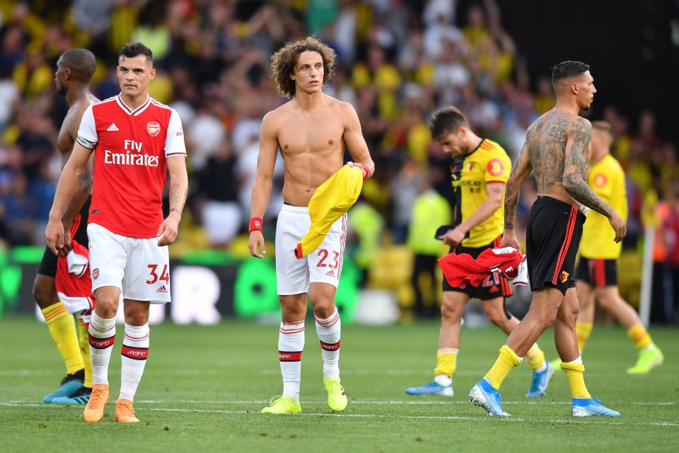  Arsenal surrendered a two-goal lead at Vicarage Road to throw away two points