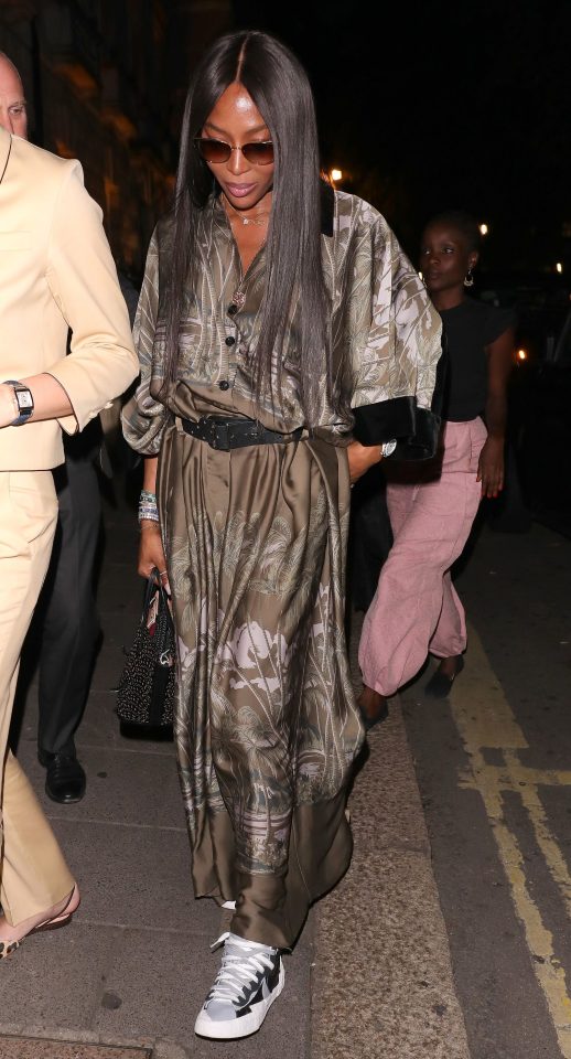  Then there was the queen of fashion herself Naomi Campbell who rocked her own version of flares dressed down with a pair of trainers