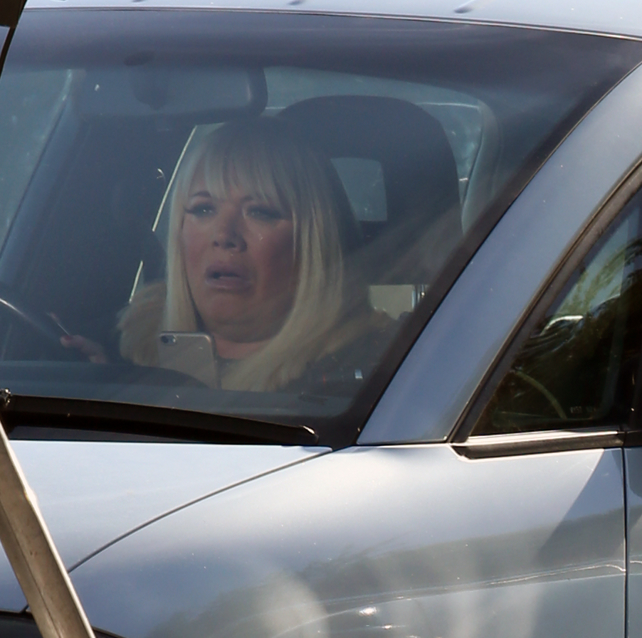  Sharon looks horrified as she watches the car flip