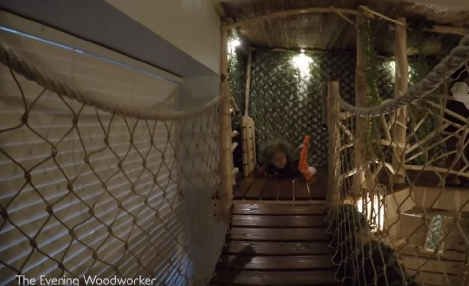  The indoor treehouse features a swinging bridge