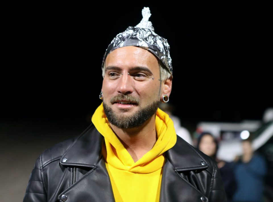  Some had even fashioned a tin foil hat to wear