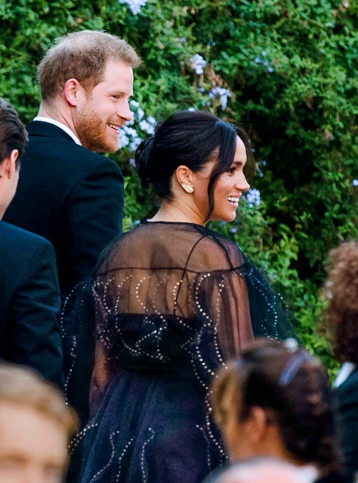 Meghan Markle wore an £8,900 black Valentino dress to the wedding of her friend Misha Nonoo in Rome yesterday