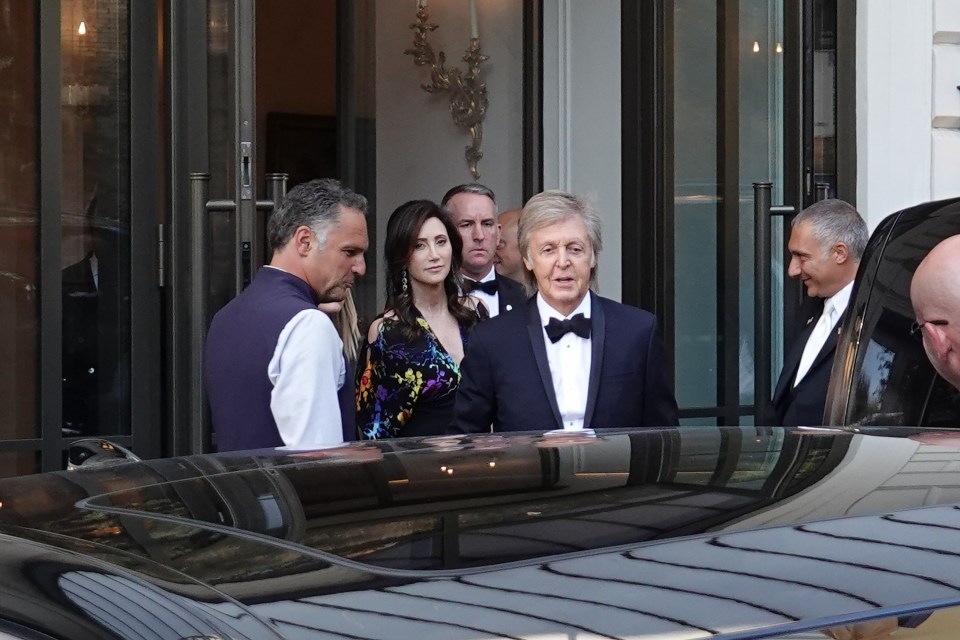 Paul McCartney’s wife Nancy Shevell wore a black dress featuring a colourful print to the Italian nuptials