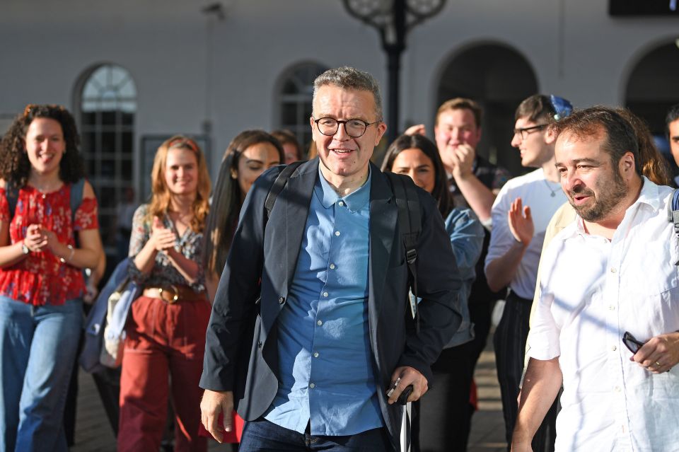  Labour Party supporters appear to applaud Tom Watson has he arrives in Brighton for the party's conference