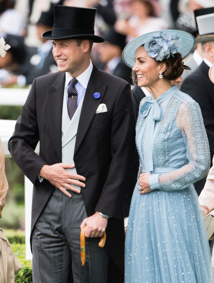  Kate was seen cradling her tummy at Ascot earlier this year