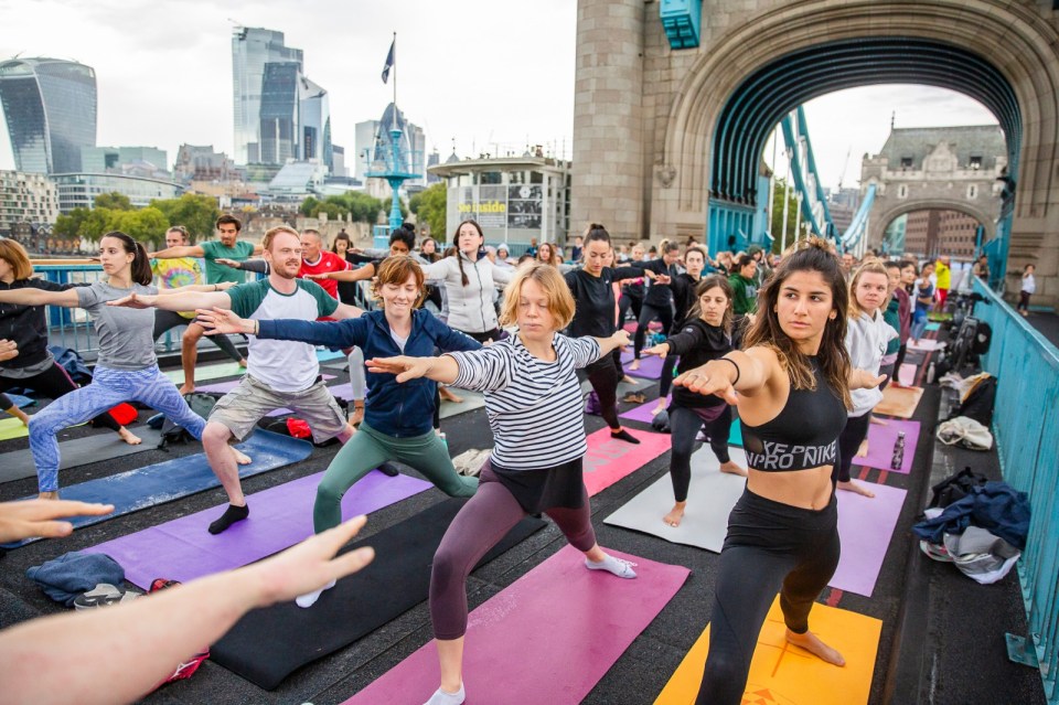  Hundreds of people took over Tower Bridge for a yoga workout