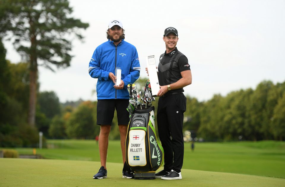  Danny Willett poses with the trophy and his caddie