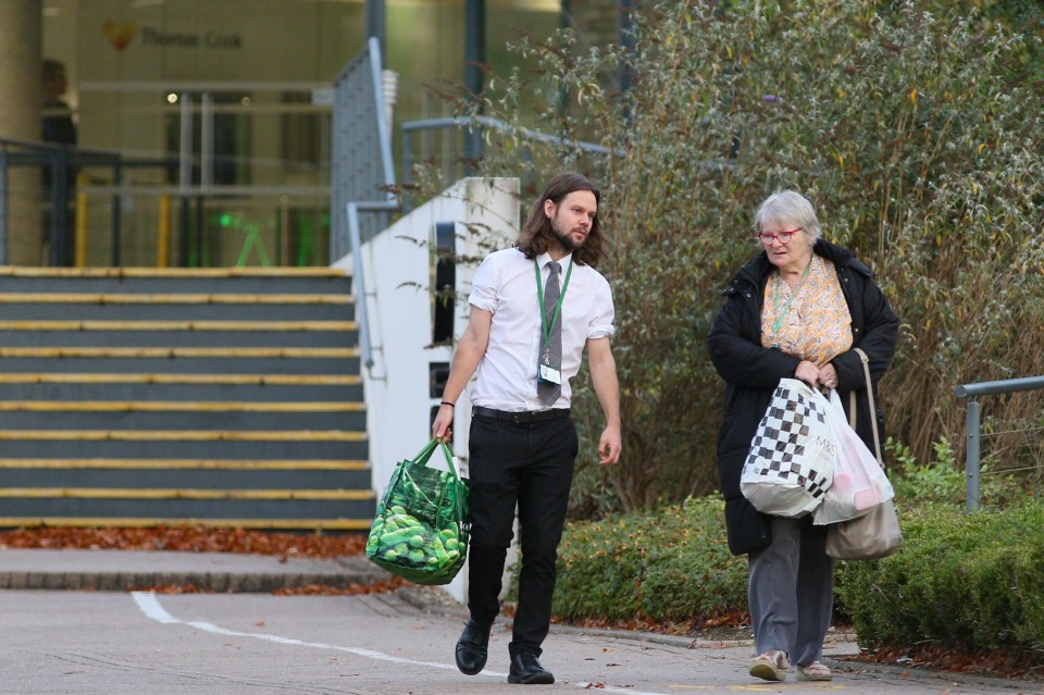 Thomas Cook leave the firm’s HQ after it collapsed last night