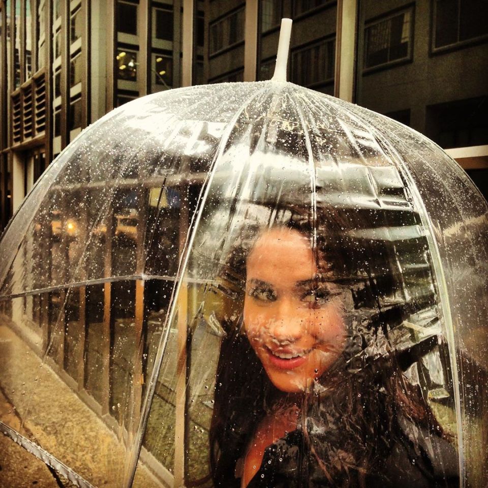  This cheeky candid shot sees a younger Meg on a rainy day in Toronto where the show was filmed