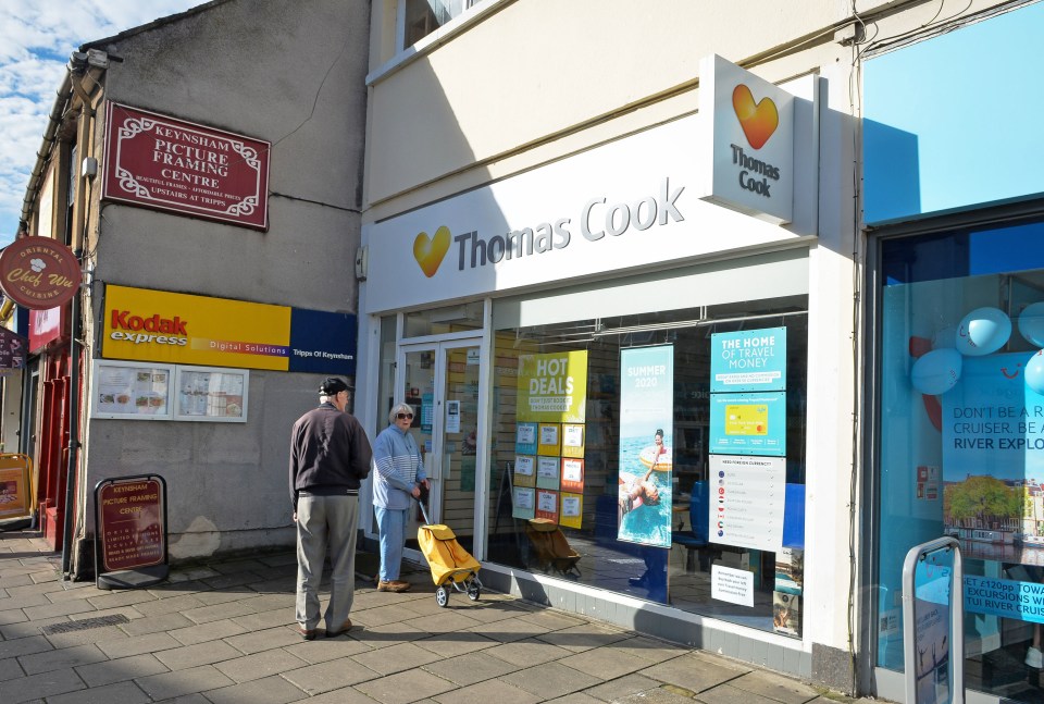 People outside the Keynsham, Bath and North East Somerset branch of Thomas Cook