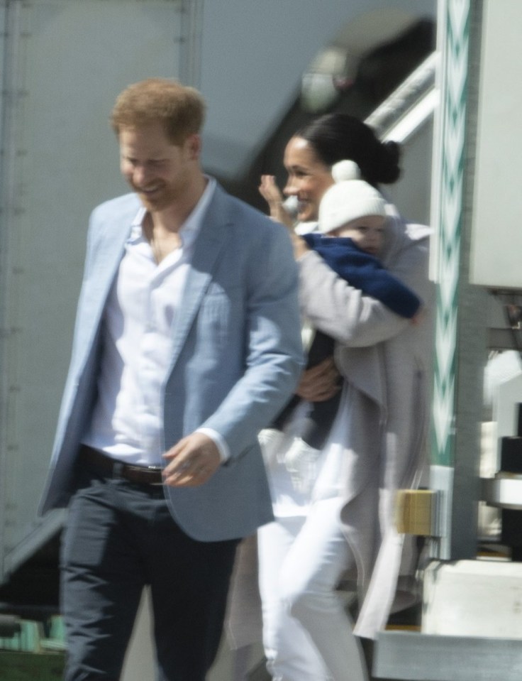 Meghan Markle and Prince Harry arrived in Cape Town with son Archie in tow wearing a bobble hat