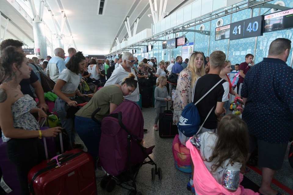 British tourists, flying with Thomas Cook, queue at the Enfidha International airport in Tunisia