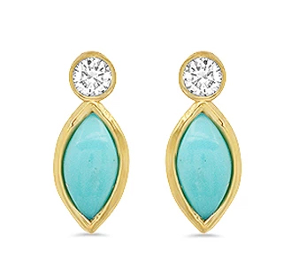  Meghan's earrings feature a single diamond stud with a turquoise marquise cut stone