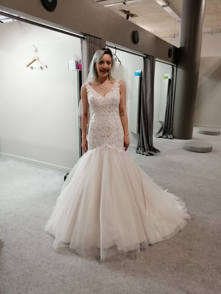 Amber Merritt was furious when an online troll shared snaps of her wearing her wedding dress options to her fiance