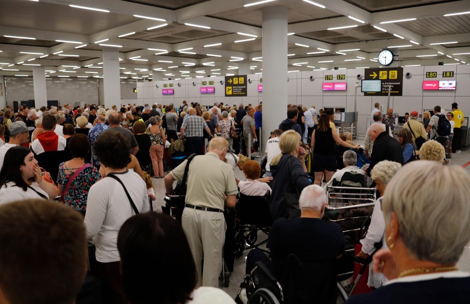  Passengers wait in Majorca on Tuesday as they wait to be brought back to Britain