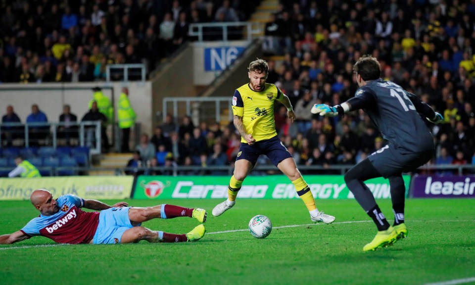  Matty Taylor doubled Oxford's lead against the Hammers at the Kassam Stadium