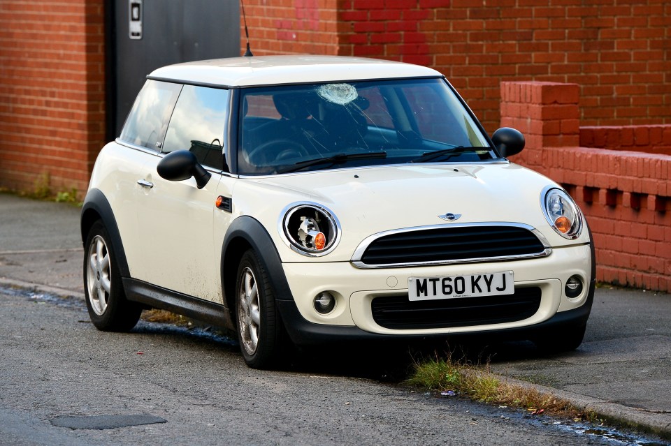  The white Mini involved in the apparent hit-and-run was abandoned nearby