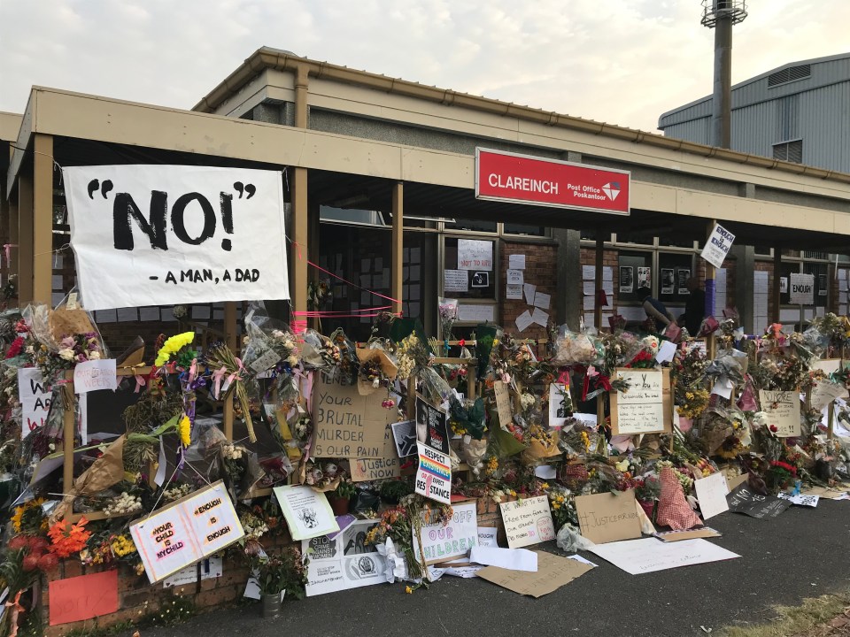  Yellow ribbons have been left as tributes and Meghan left a moving message, written by her, in local language Xhosa: 'We stand together in this situation'