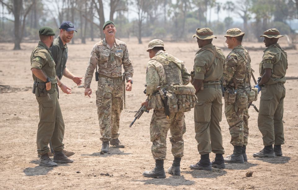  The iconic regimental kukri knife cold be seen hanging from the Gurkha's belt as the group shared a joke with the prince