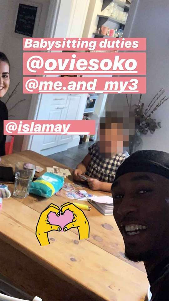  Love Island's Ovie and India prove their love is still strong after cruel split rumours as they babysit toddler together