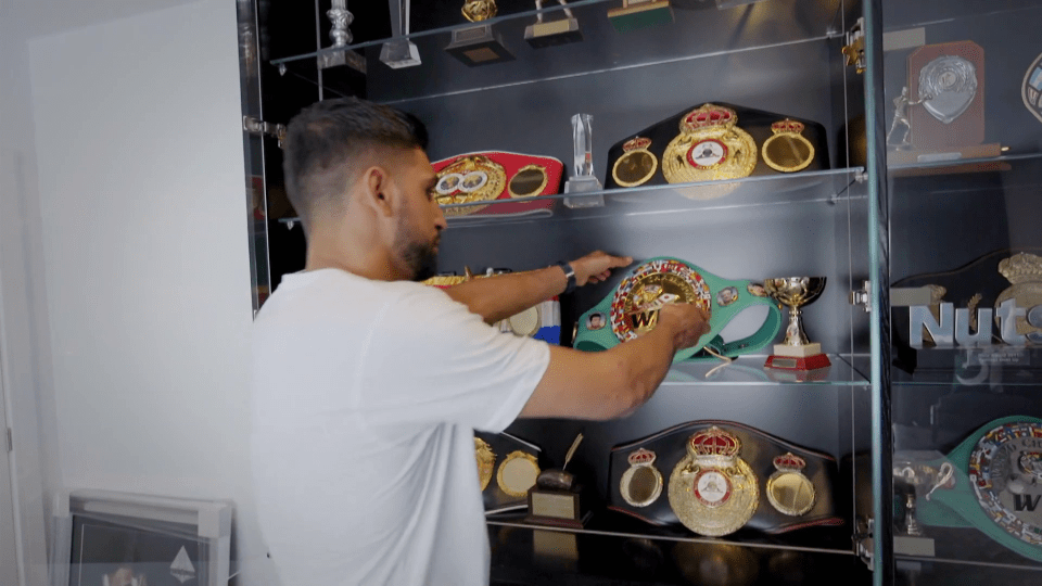 Amir has a sparkling cabinet full of his trophies