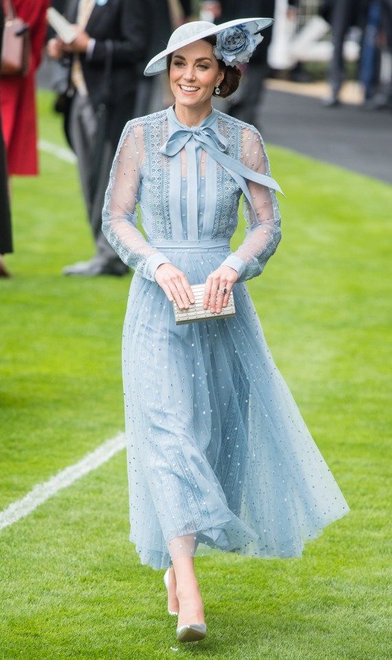  Stepping straight out of a fairy tale, Kate looks every inch the princess in a powder-blue lace dress by Elie Saab, beautifully accessorised with a stunning Philip Treacy hat